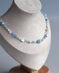 Collier fleurs - Bleu clair