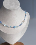 Collier fleurs - Bleu clair